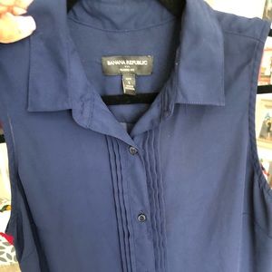 Express Neck Collar sleeveless blouse.